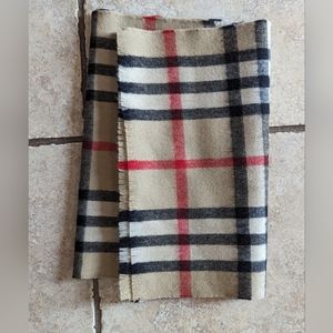 Pure Wool designer like scarf. New without tags. 11.5 " W x 59" L